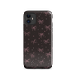 Midnight Bow seamless repeat pattern — pink hand-drawn ribbon bows and sparkle stars on a black background