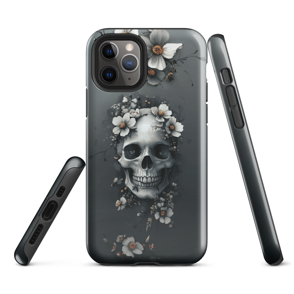 Gothic phone case with a floral skull design in grey tones, featuring white blossoms and dark detailing.
