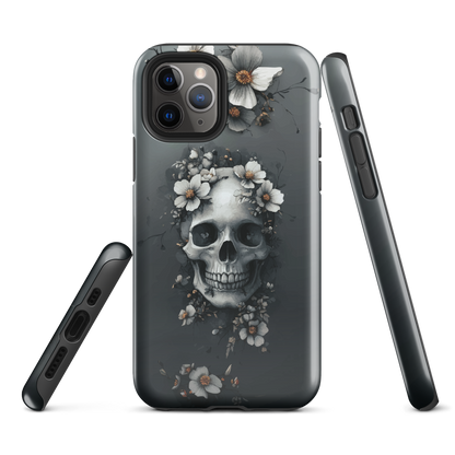 Gothic phone case with a floral skull design in grey tones, featuring white blossoms and dark detailing.