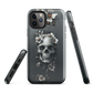Gothic phone case with a floral skull design in grey tones, featuring white blossoms and dark detailing.