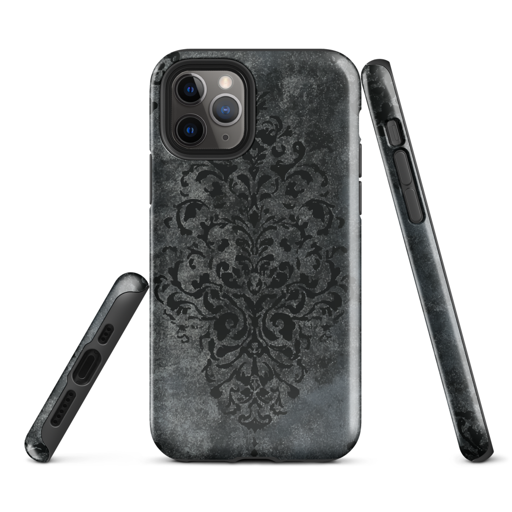 Dark damask patterned phone case with a vintage gothic aesthetic and textured stone background.