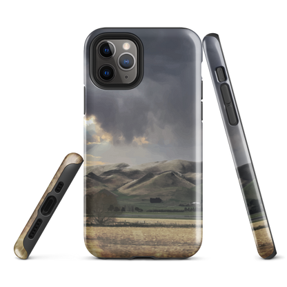 Designer phone case with NZ landscape painting of Te Hauke and cloudy skies by Ben Hart.