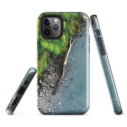 Resting Place phone case with aerial artwork of river rocks, green bush, and driftwood in a New Zealand stream.