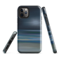 Dark abstract phone case with blue and grey streaks and glossy finish.