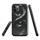 Phone case with detailed black python design on dark background.