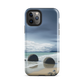Moeraki Boulders coastal designer phone case with ocean waves and dramatic NZ sky