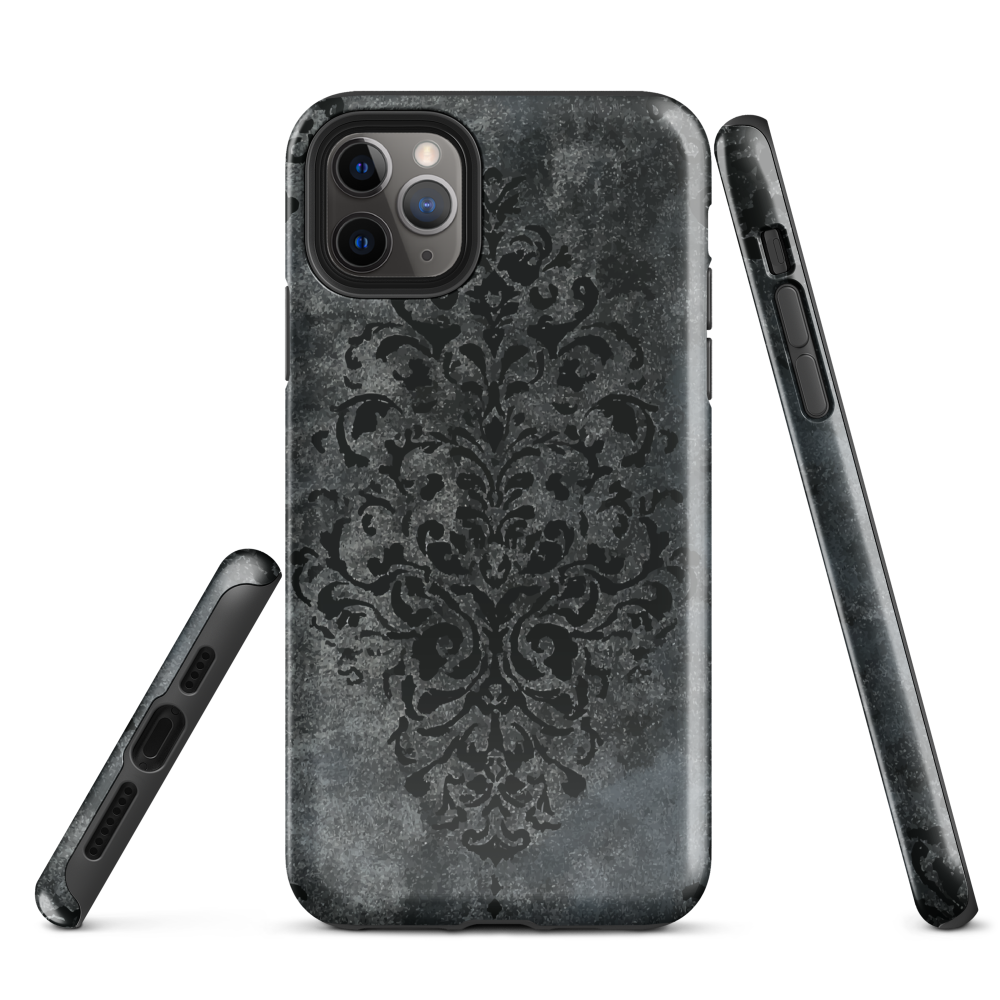 Dark damask patterned phone case with a vintage gothic aesthetic and textured stone background.