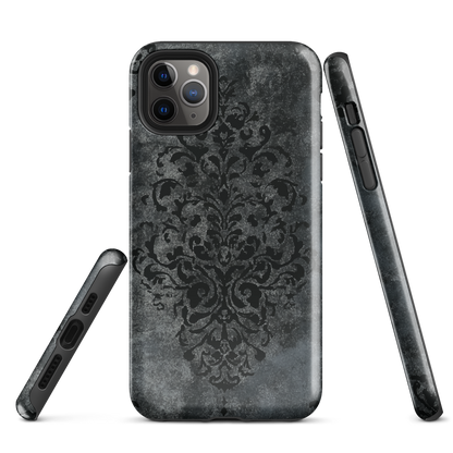 Dark damask patterned phone case with a vintage gothic aesthetic and textured stone background.