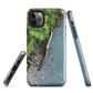 Resting Place phone case with aerial artwork of river rocks, green bush, and driftwood in a New Zealand stream.