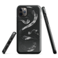Phone case with detailed black python design on dark background.