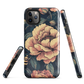 Phone case with vintage-style pink roses and bees on dark background, floral New Zealand artwork.