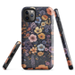Phone case with colourful wildflowers on dark background, floral art design