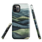 Phone case with layered mountain and forest landscape in blue and green hues