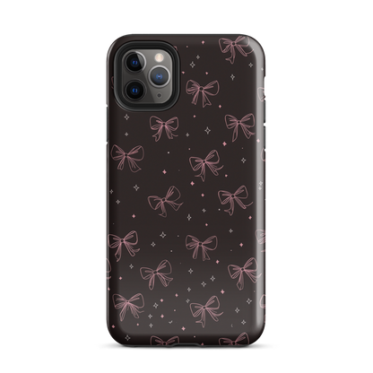 Midnight Bow seamless repeat pattern — pink hand-drawn ribbon bows and sparkle stars on a black background