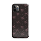 Midnight Bow seamless repeat pattern — pink hand-drawn ribbon bows and sparkle stars on a black background