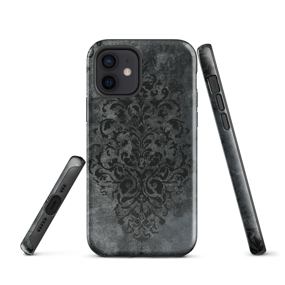 Dark damask patterned phone case with a vintage gothic aesthetic and textured stone background.