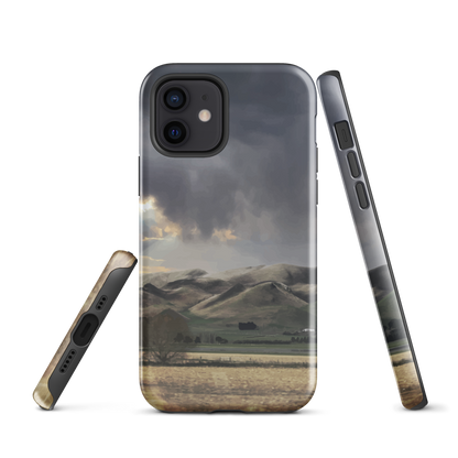 Designer phone case with NZ landscape painting of Te Hauke and cloudy skies by Ben Hart.