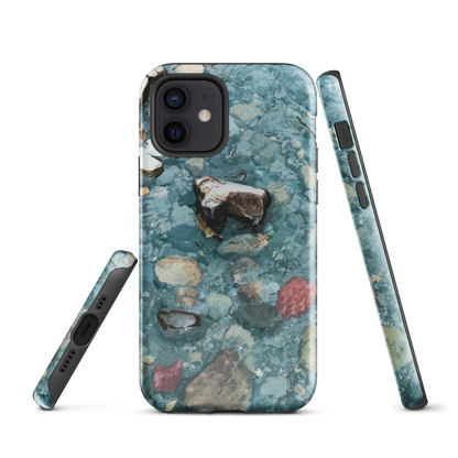 Washed Away designer phone case with abstract river stone artwork in earthy blues and natural tones.