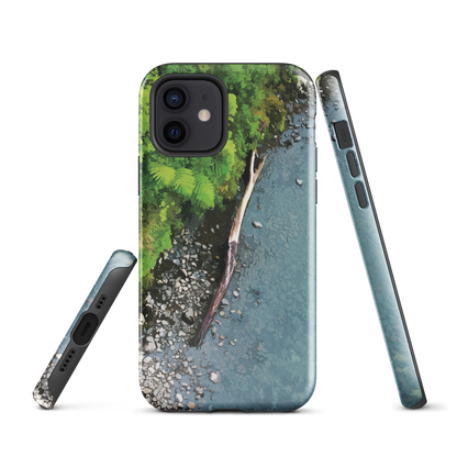 Resting Place phone case with aerial artwork of river rocks, green bush, and driftwood in a New Zealand stream.