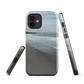 Phone case with a scenic photo of Riversdale Beach and ocean waves.