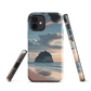 Phone case with Cathedral Cove beach and sunset scene, featuring soft skies and sea stack