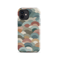 A soft retro-inspired phone case featuring layered arc shapes in warm, earthy tones.