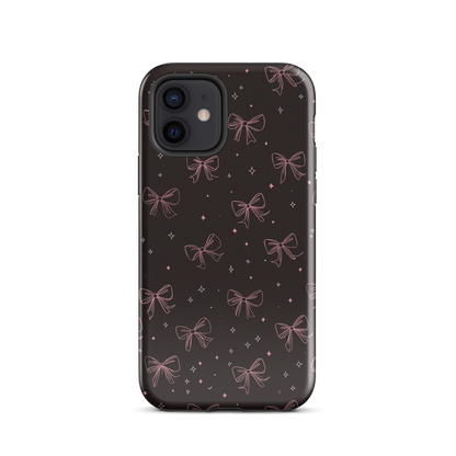 Midnight Bow seamless repeat pattern — pink hand-drawn ribbon bows and sparkle stars on a black background