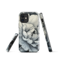 Black and white floral phone case featuring a soft, moody peony design by New Zealand artist Ben Hart.