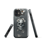 Gothic phone case with a floral skull design in grey tones, featuring white blossoms and dark detailing.