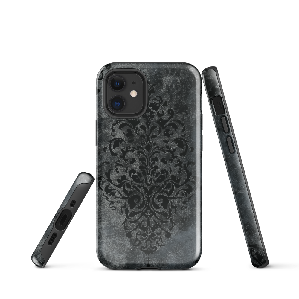 Dark damask patterned phone case with a vintage gothic aesthetic and textured stone background.