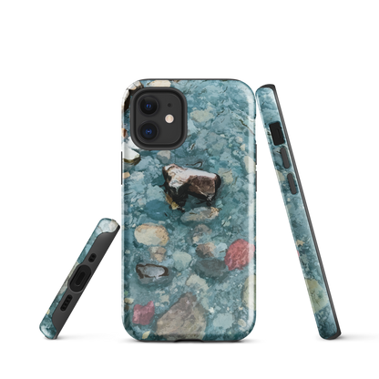 Washed Away designer phone case with abstract river stone artwork in earthy blues and natural tones.