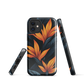 Phone case with bold orange bird of paradise flowers on dark background.