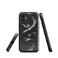 Phone case with detailed black python design on dark background.