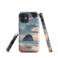 Phone case with Cathedral Cove beach and sunset scene, featuring soft skies and sea stack