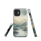 Phone case with soft mountain and valley design in misty green, blue, and golden tones