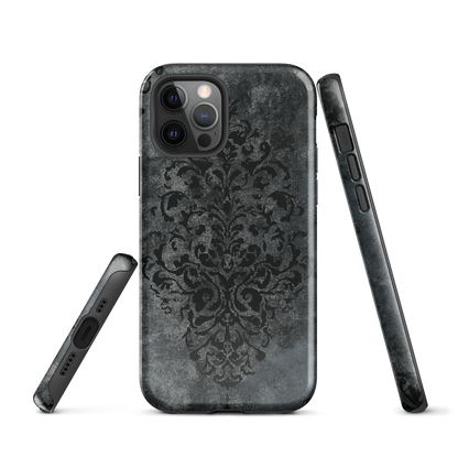 Dark damask patterned phone case with a vintage gothic aesthetic and textured stone background.