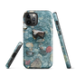 Washed Away designer phone case with abstract river stone artwork in earthy blues and natural tones.