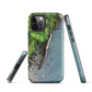 Resting Place phone case with aerial artwork of river rocks, green bush, and driftwood in a New Zealand stream.