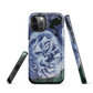 Designer phone case with a bold blue rose artwork and glossy finish.