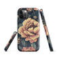 Phone case with vintage-style pink roses and bees on dark background, floral New Zealand artwork.
