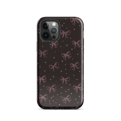 Midnight Bow seamless repeat pattern — pink hand-drawn ribbon bows and sparkle stars on a black background