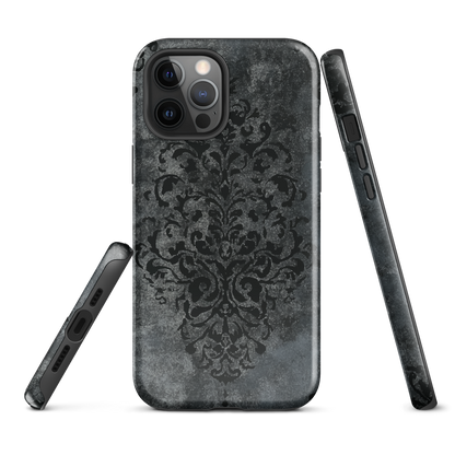 Dark damask patterned phone case with a vintage gothic aesthetic and textured stone background.