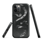 Phone case with detailed black python design on dark background.
