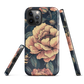Phone case with vintage-style pink roses and bees on dark background, floral New Zealand artwork.