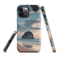 Phone case with Cathedral Cove beach and sunset scene, featuring soft skies and sea stack