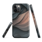 Phone case with flowing abstract design in black, copper and charcoal tones, inspired by dusk shadows