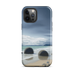 Moeraki Boulders coastal designer phone case with ocean waves and dramatic NZ sky