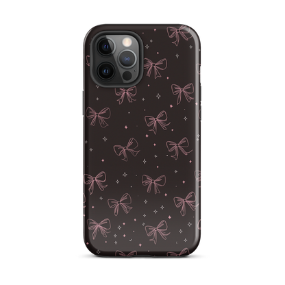 Midnight Bow seamless repeat pattern — pink hand-drawn ribbon bows and sparkle stars on a black background