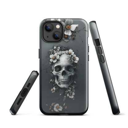 Gothic phone case with a floral skull design in grey tones, featuring white blossoms and dark detailing.