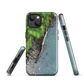 Resting Place phone case with aerial artwork of river rocks, green bush, and driftwood in a New Zealand stream.